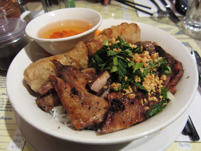 Vermicelli bowl with spring roll and pork